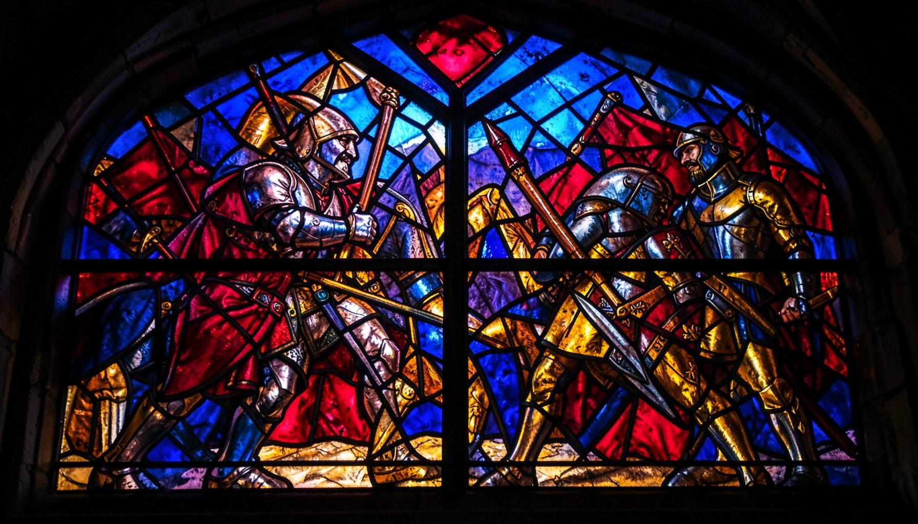 A dramatic stained-glass composition with bold leaded segments depicting armoured fighters in a medieval tournament scene, rich ruby reds, deep cobalt blues, and amber golds glowing against dark iron-grey leading.